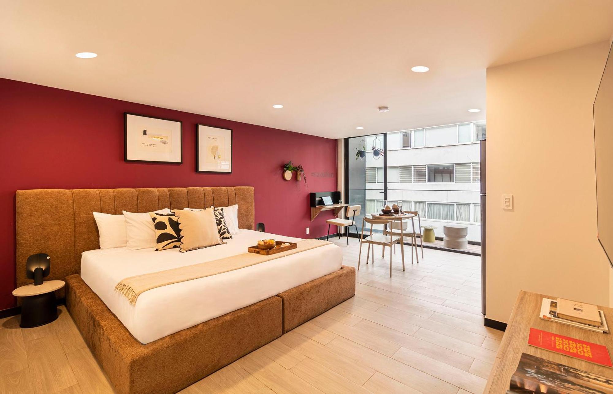 Studio apartment with king bed and balcony
