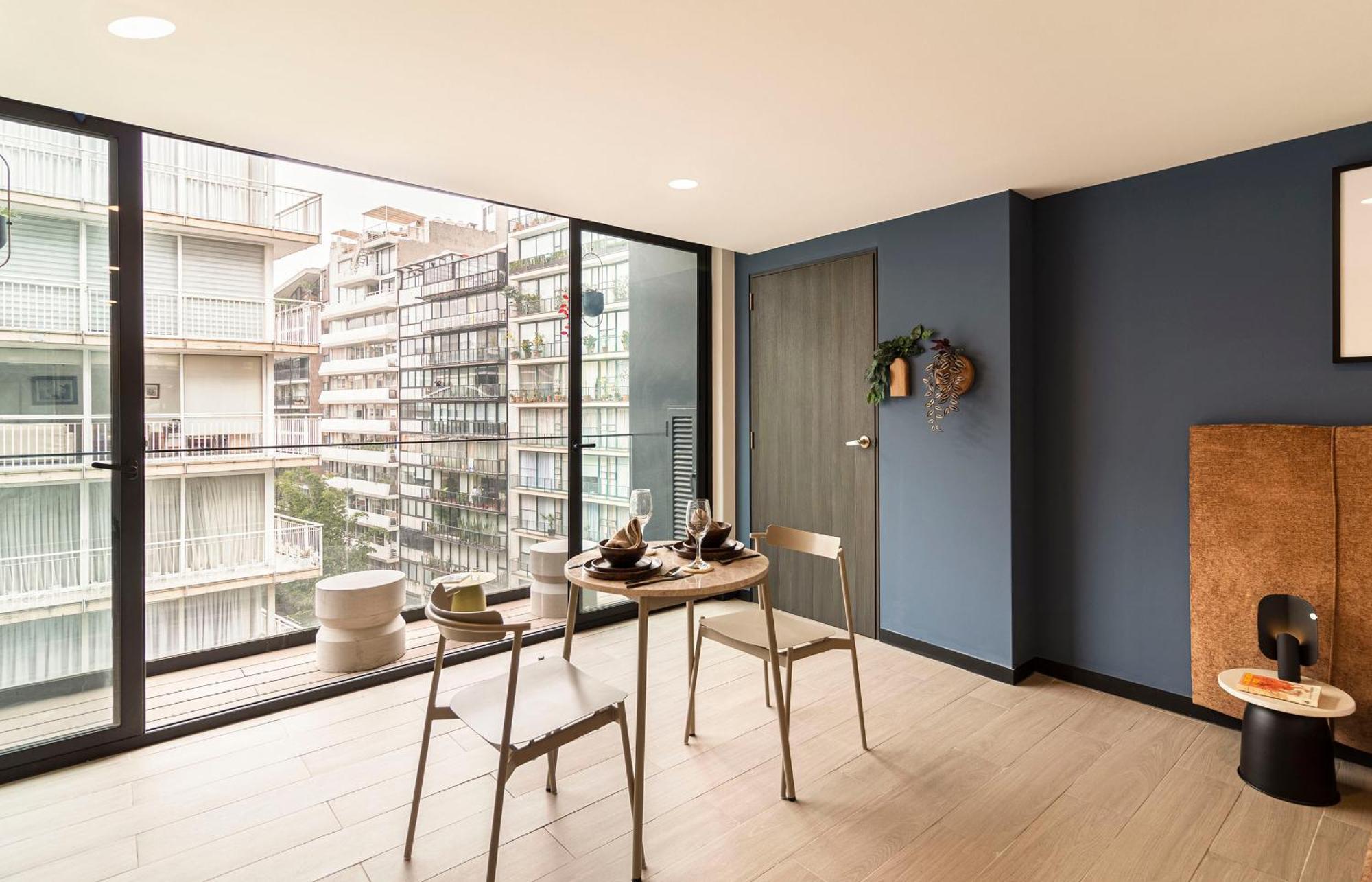 Studio apartment with queen bed and balcony